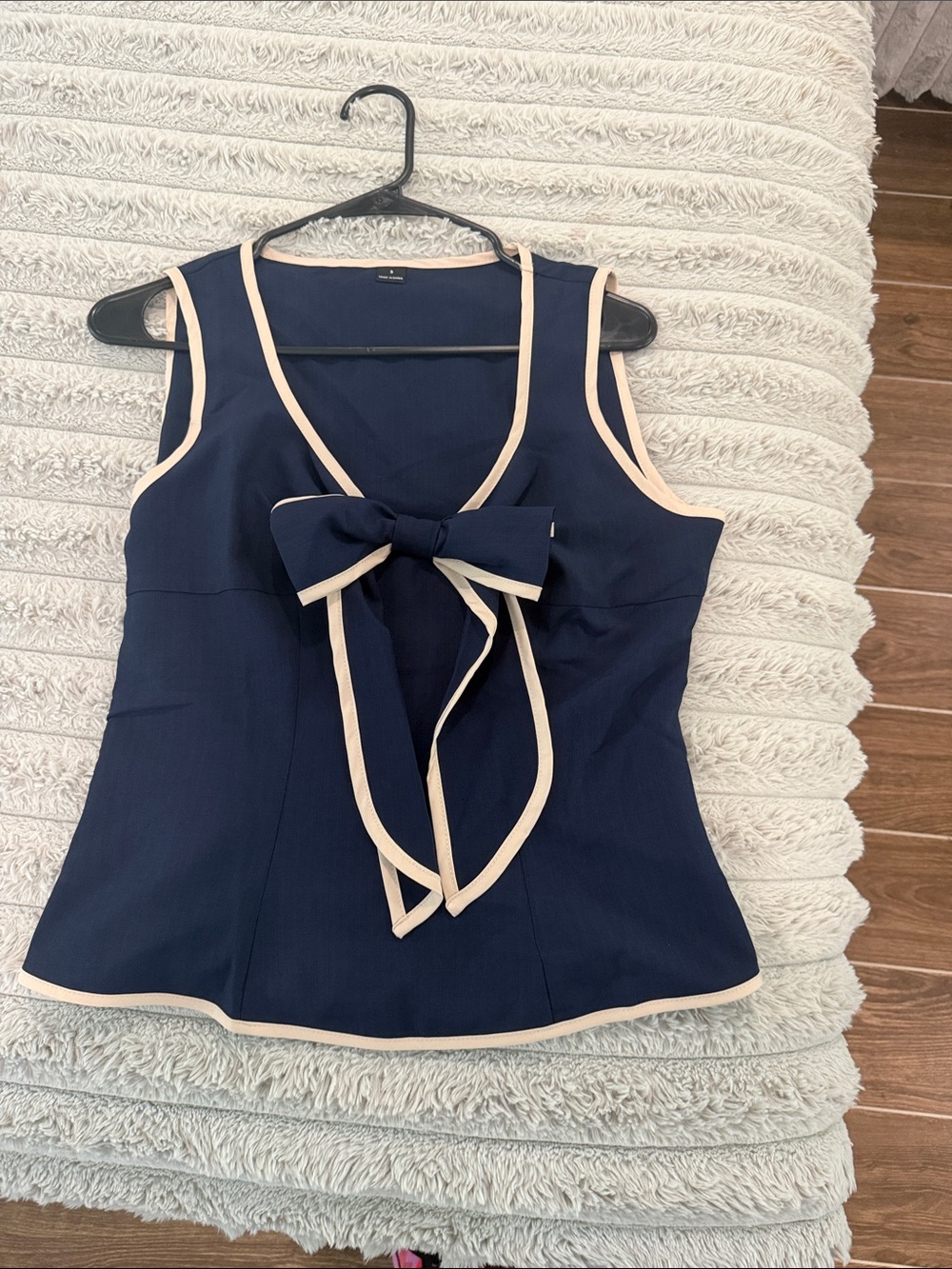 Navy Sleeveless Bow-Front Blouse with Cream Trim